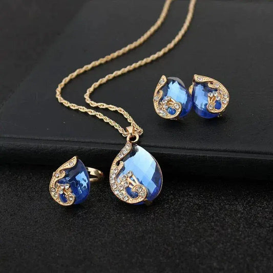 Conjunto de Collar y Pendientes en Cristal Azul con Dorado