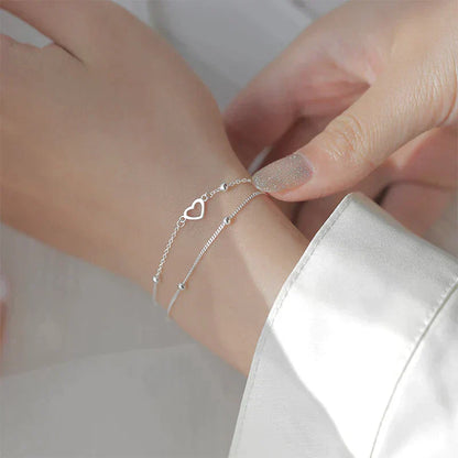 Pulsera ajustable con corazón en plata