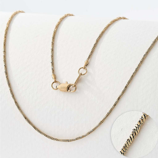 Cadena Singapur Mujer