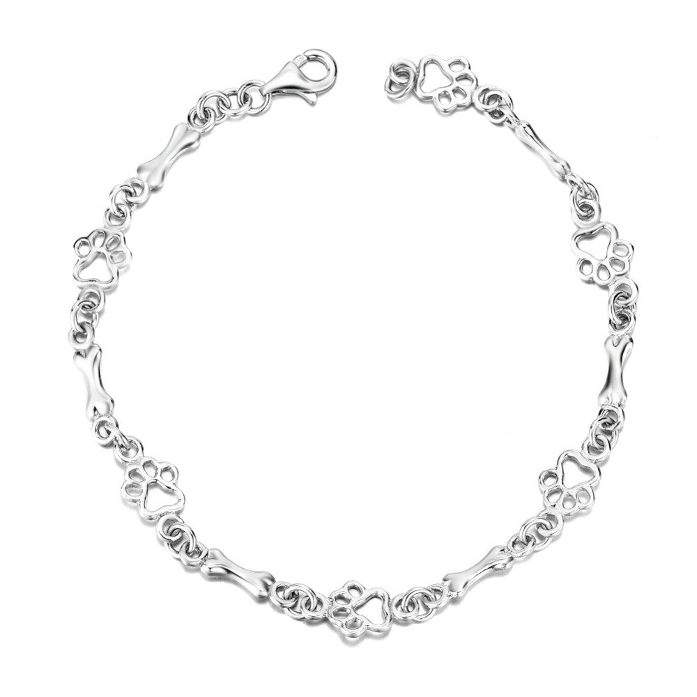 Pulsera con Colgantes de Huella de Perro y Hueso en Plata Pura, Edición Limitada