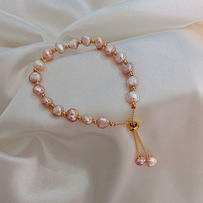 Pulsera de Perlas Rosa en Oro