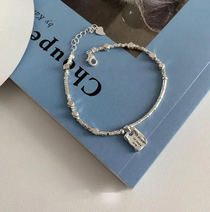 Pulsera cuadrada Amor Plateado