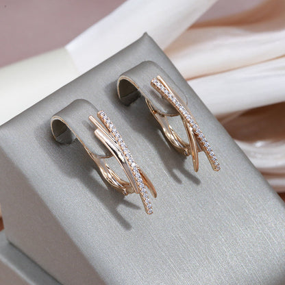 Pendientes Cruz Elegante en Oro