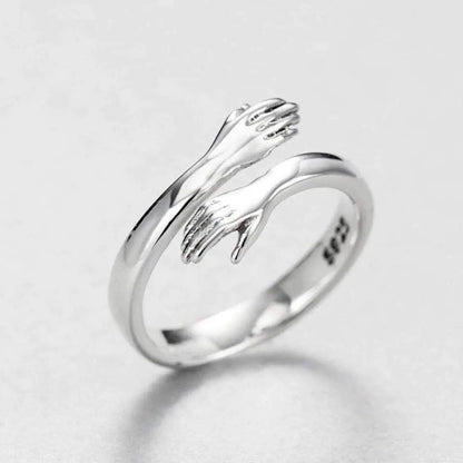 Anillo Ajustable Tipo Abrazo en Plateado