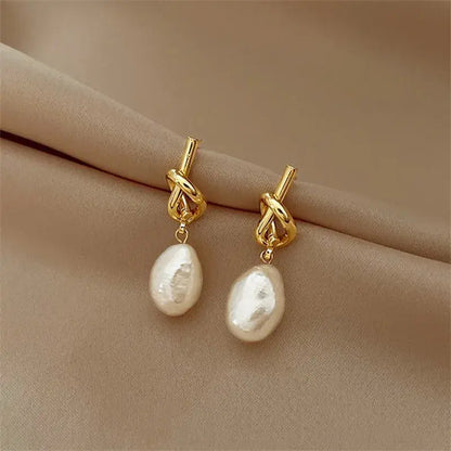 Pendientes Elegantes con Perlas Barrocas en Oro