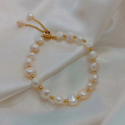 Pulsera Vintage Blanca con Perlas y Oro