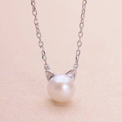 Hermoso collar de gato y perla con pendientes y anillo gratis
